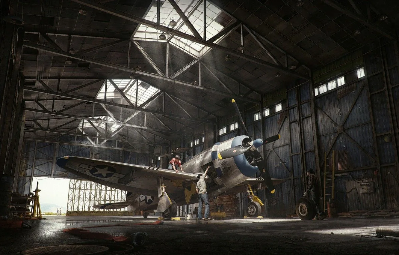 Vintage propeller aircraft inside a sunlit hangar
